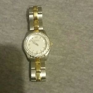 Ladies stainless steel and gold Bulova diamond enc